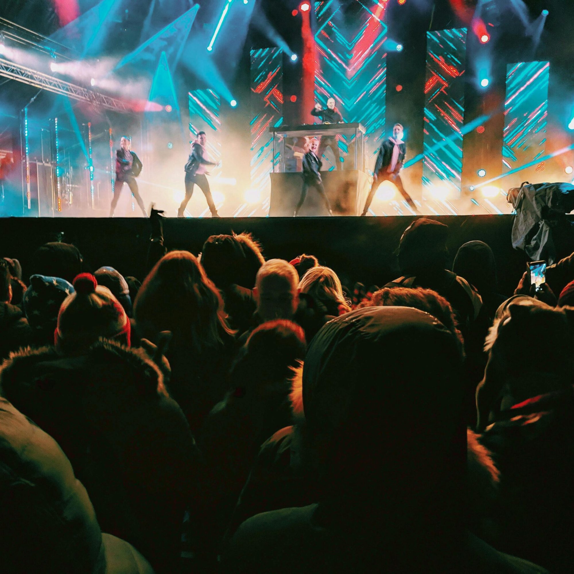 pexels-photo-1755087-1755087 Energetic concert crowd enjoying a nighttime performance in Helsinki with vibrant lights and performers.